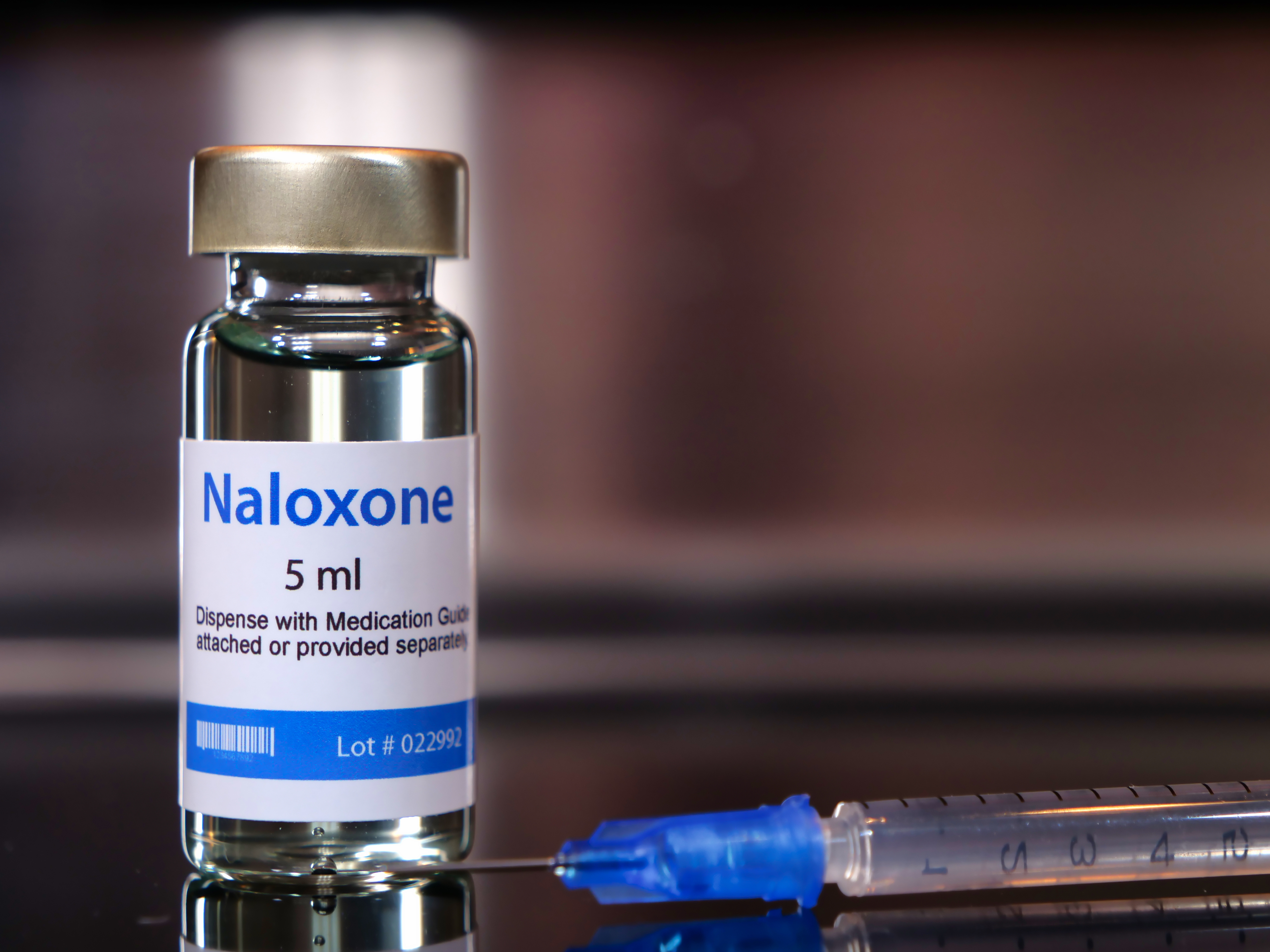 Vial of naloxone with syringe