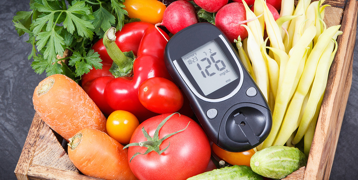 Glucometer with fresh vegetables