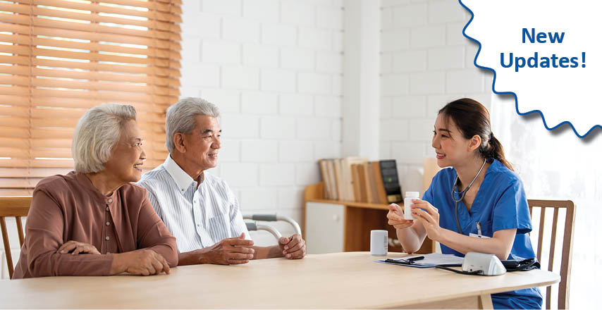 Image of older couple sitting across the table from a medical professional