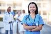 Happy asian doctor or woman in portrait for hospital leadership, internship opportunity or career integrity.