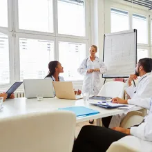 Group of medical professionals at a discussion table