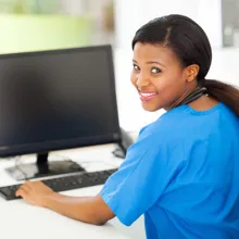 female black nurse in modern office
