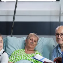 Nurse engaging patient and family