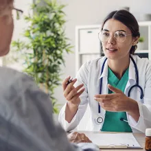 Doctor and patient having discussing at clinic