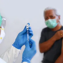 Patient receiving vaccine injection 