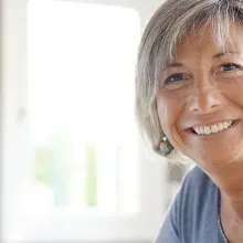 Portrait of mature businesswoman working on desktop