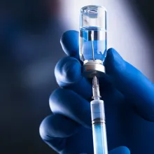 COVID vaccine medicine and needle 