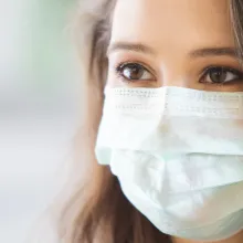 close up face woman wearing medical mask for prevent dust and infection virus.