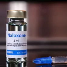 Vial of naloxone with syringe