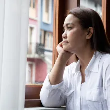 Woman starring out of window