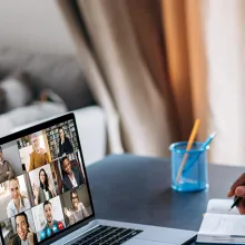 African American male on a virtual call with multiple people