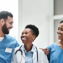 Providers smiling at each other 