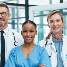 Group of providers standing next to each other smiling