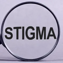 The word stigma in a magnifying glass