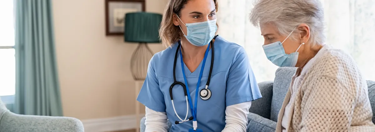 Nurse and patient looking over information on a tablet