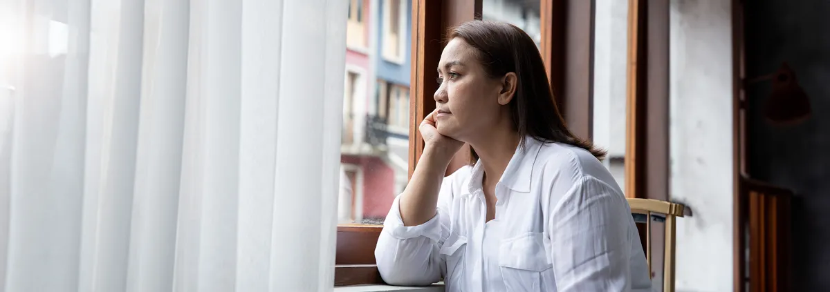 Woman starring out of window