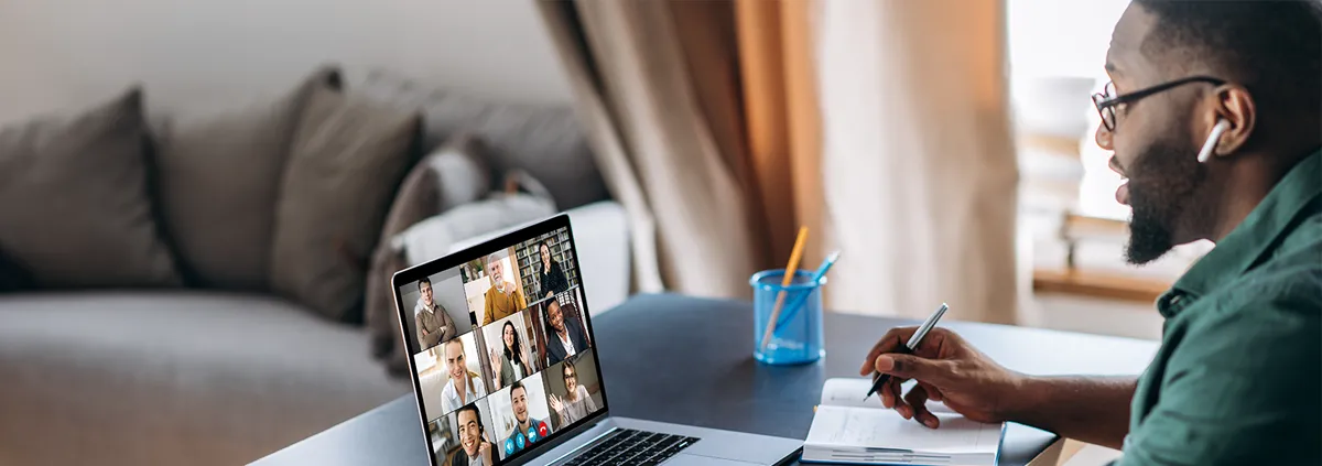 African American male on a virtual call with multiple people