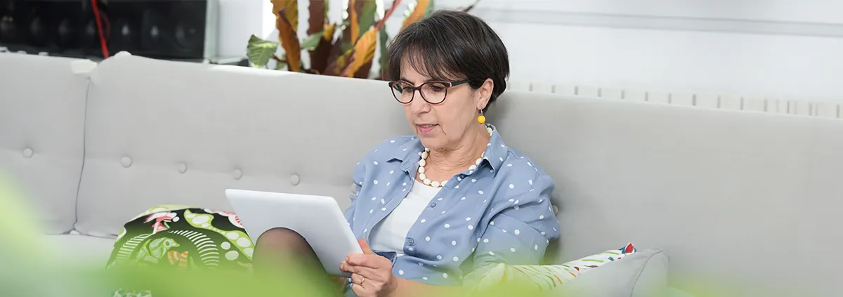 Lady reading on tablet