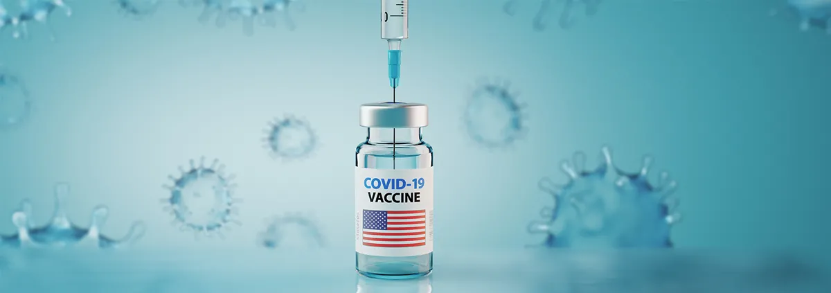 COVID vaccine vile with a USA flag
