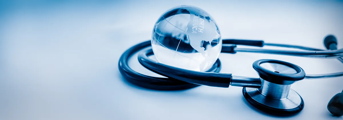 glass globe centered in a stethoscope  