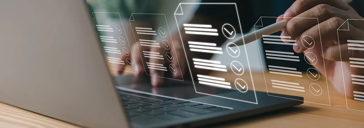 Image of computer projecting a document icon with checkmarks