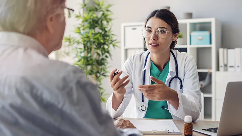 Doctor and patient having discussing at clinic